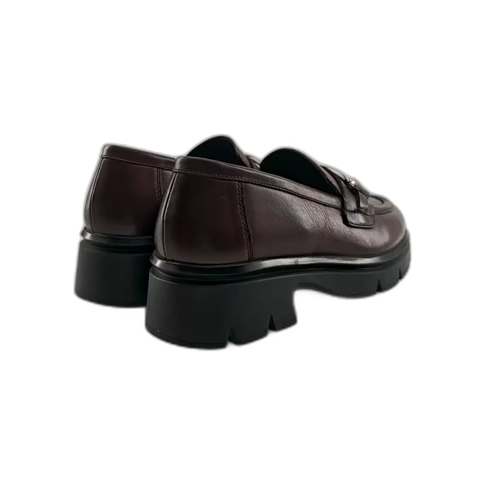 Pair of burgundy leather loafers with thick black rubber lug soles, back view