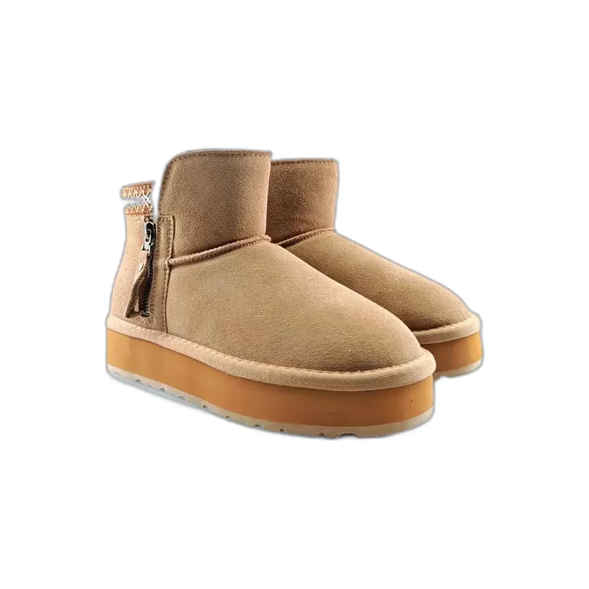 Tan suede ankle boots with zipper on side and thick rubber sole on white background