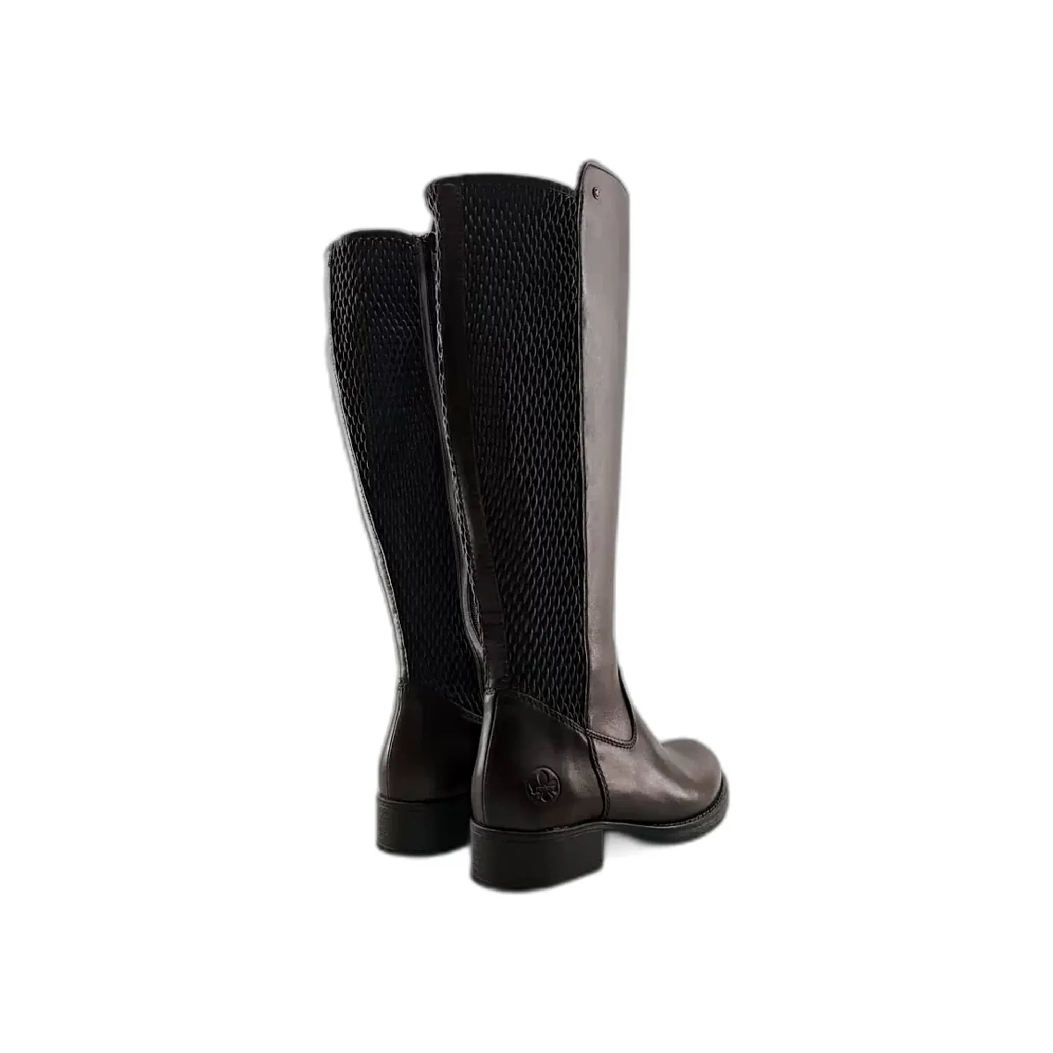 Pair of brown tall leather boots with textured back panels and low heels on white background