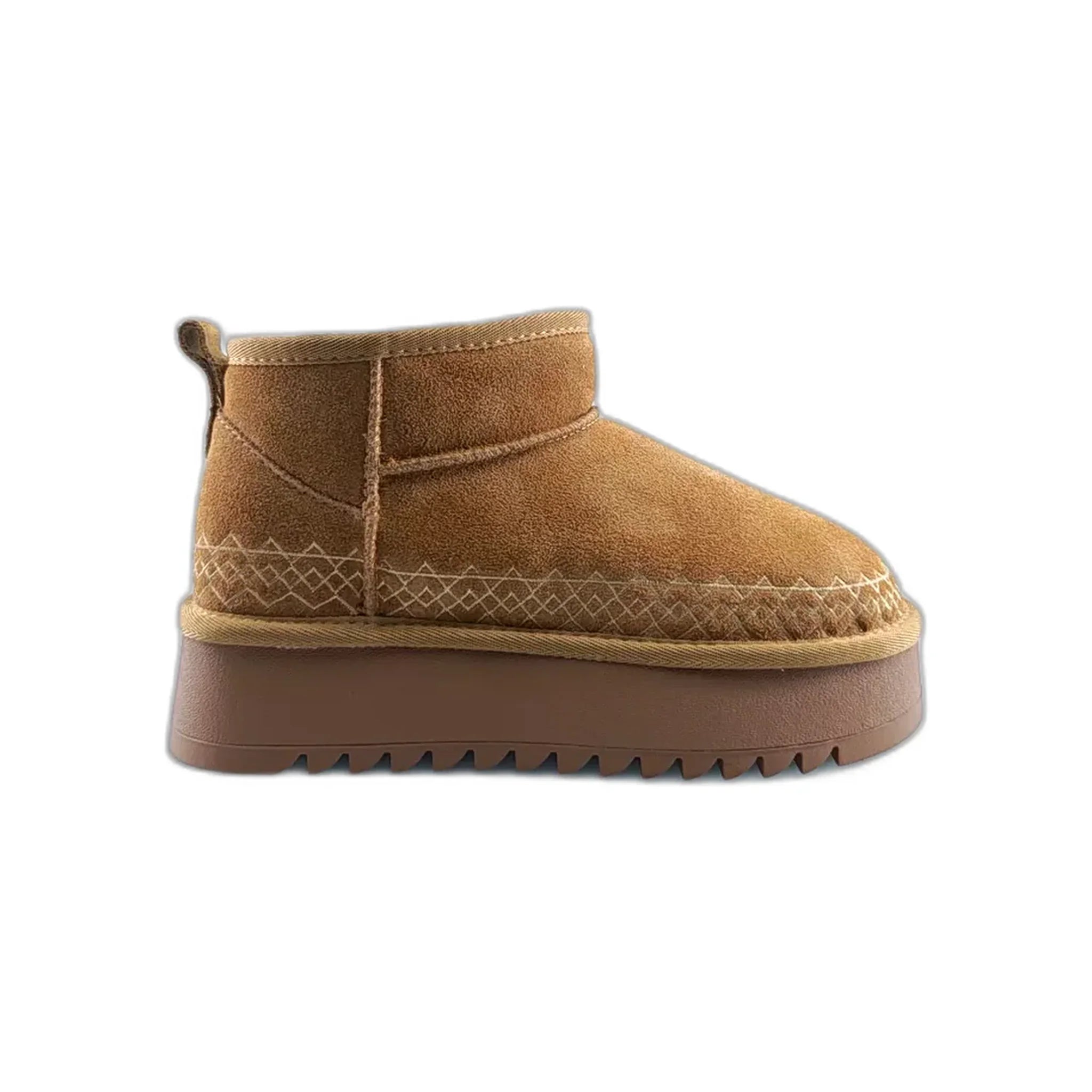 Tan suede ankle boot with patterned stitching and thick brown rubber sole on white background